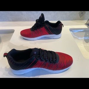 Ferrari one pair of Michael Schumacher Ferrari shoes. size euro 43 or CDN 10.